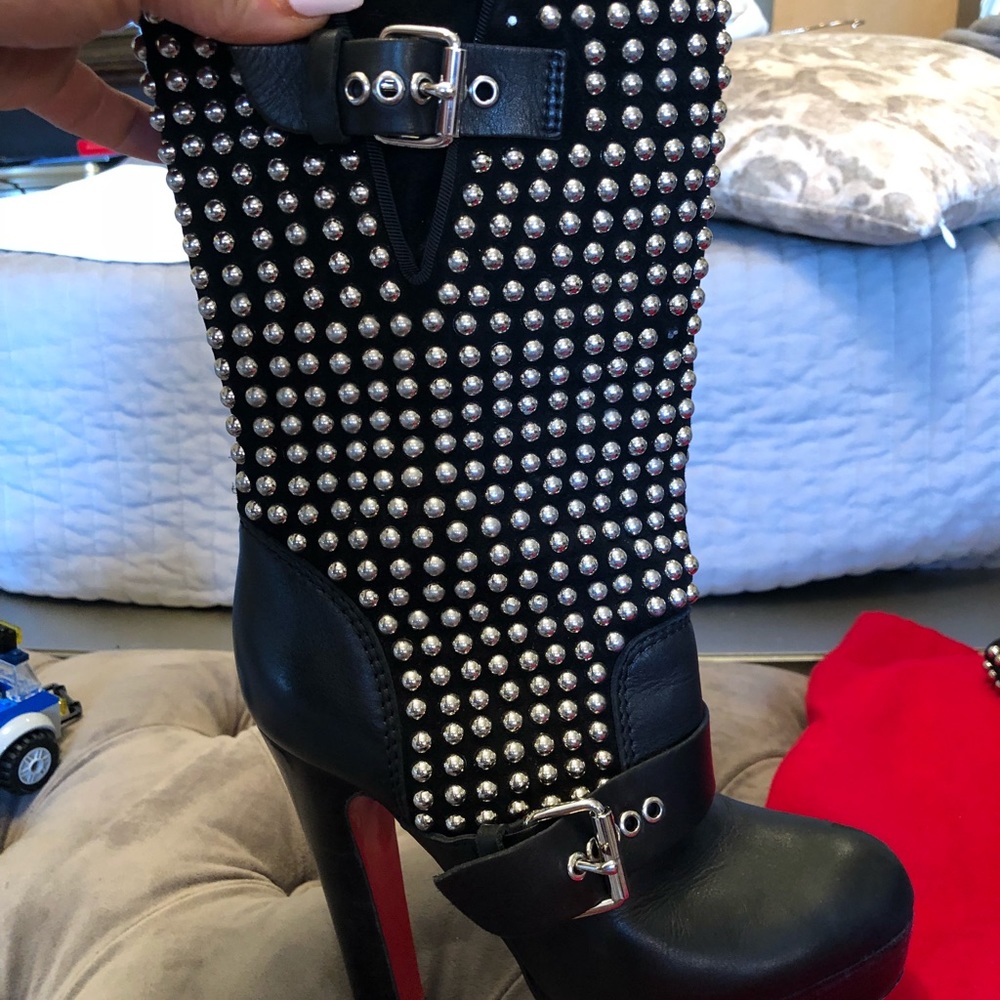 Louboutin studded boots. Make me an offer.